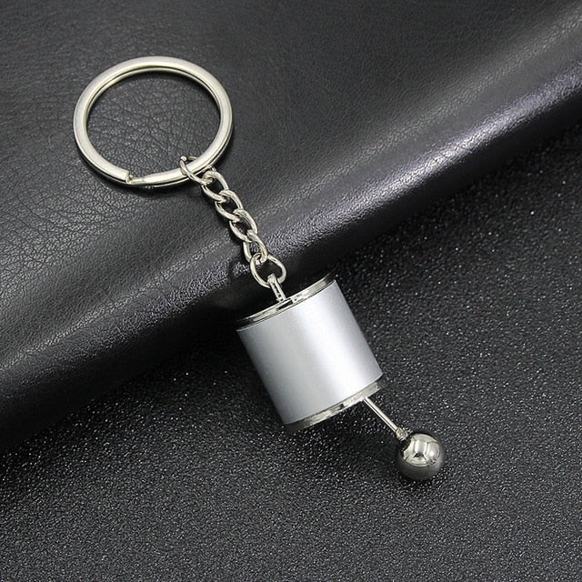 Přívěsek na klíče s miniaturní nabíječkou